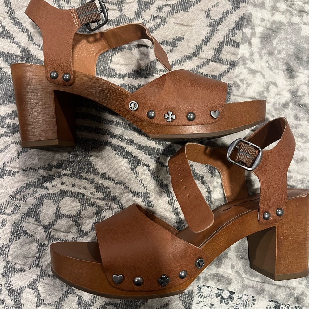 Lucky Brand open toed heels. Look brand new! Cute detail on sides